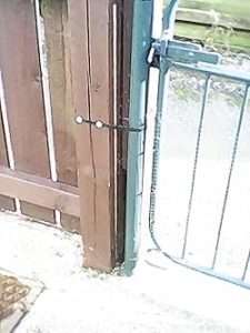 Galvanised Banding Builders All Round Steel Fixing Strap on a gate post